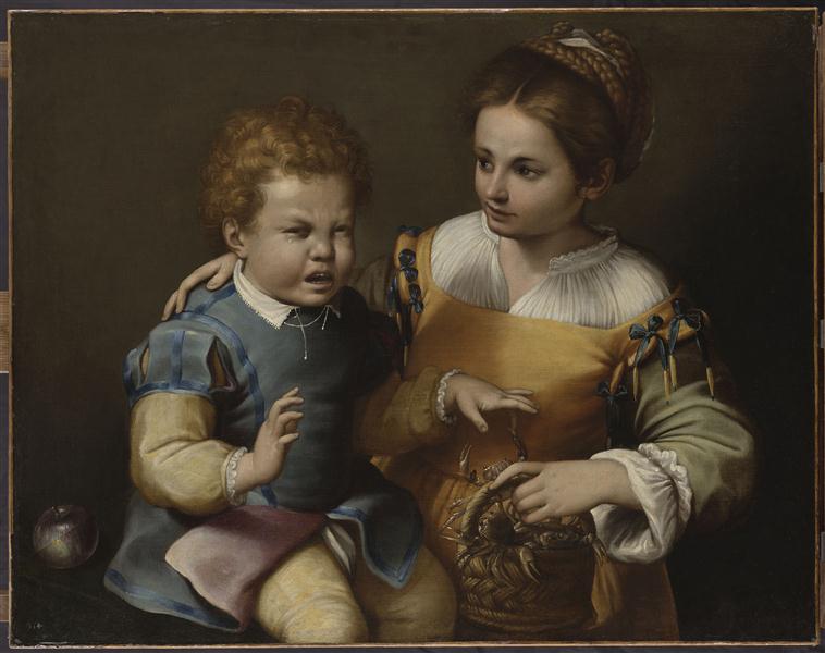 Petit garçon pincé par une écrevisse et petite fille riant