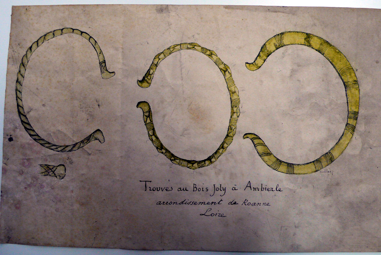 DESSIN REPRESENTANT DES BRACELETS DE L'AGE DU BRONZE TROUVES AU BOIS JOLY A AMBIERLE