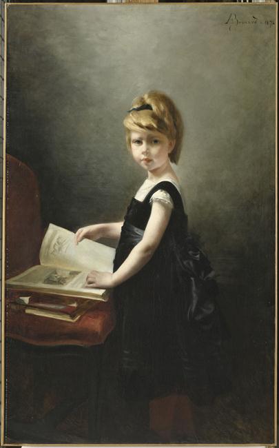 MADELEINE GEORGES, DIT FILLETTE FEUILLETANT UN LIVRE