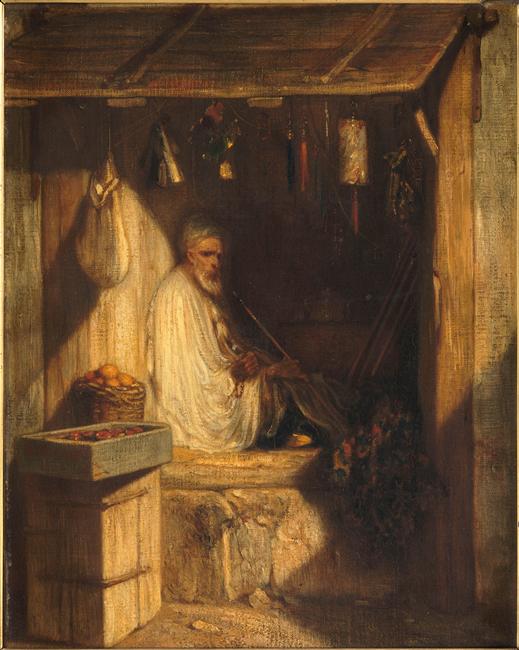 Marchand turc fumant dans sa boutique