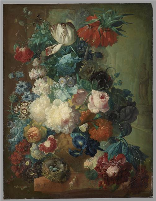 Fleurs dans un vase et nid d'oiseau