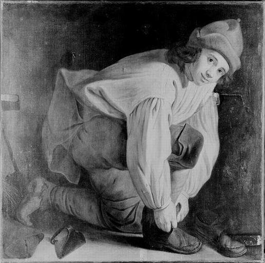 JEUNE SAVOYARD ATTACHANT SA CHAUSSURE