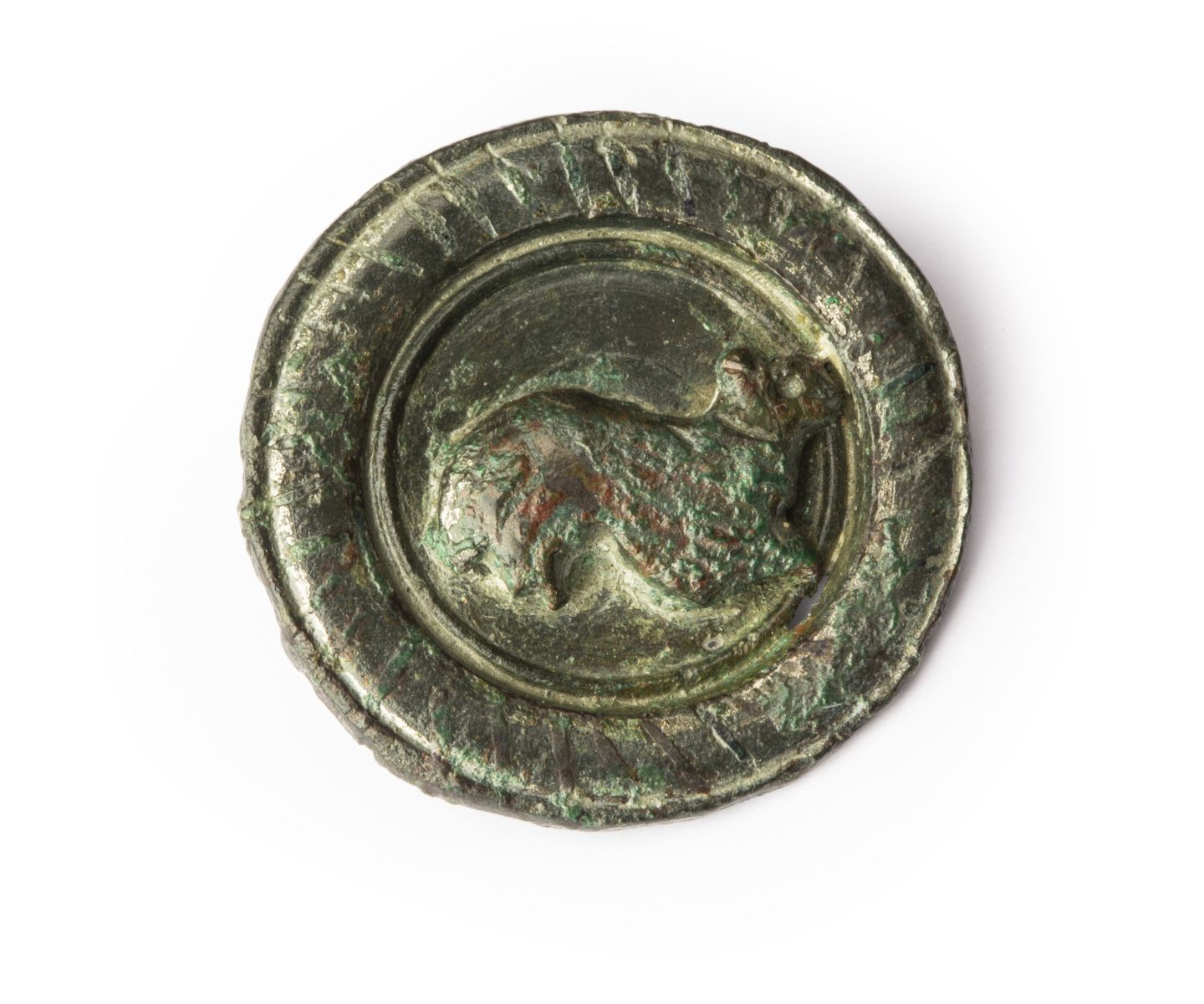 Fibule discoïdale à décor zoomorphe