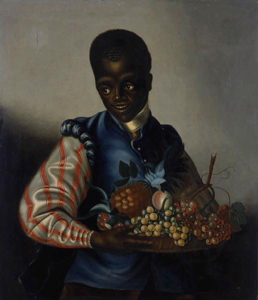 Portrait de jeune noir à la coupe de fruits