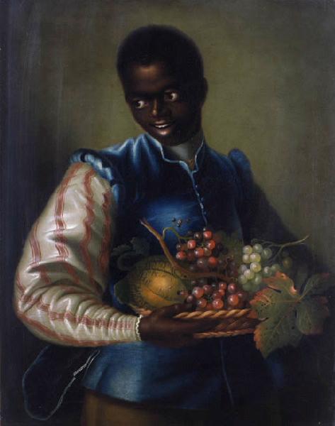 Portrait de jeune noir à la coupe de fruits