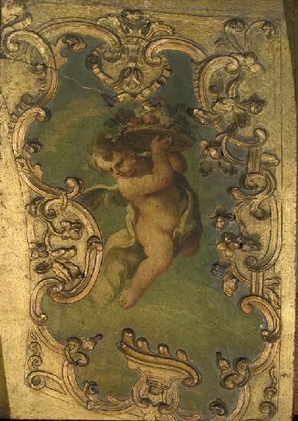 Génie tenant une corbeille de fruits