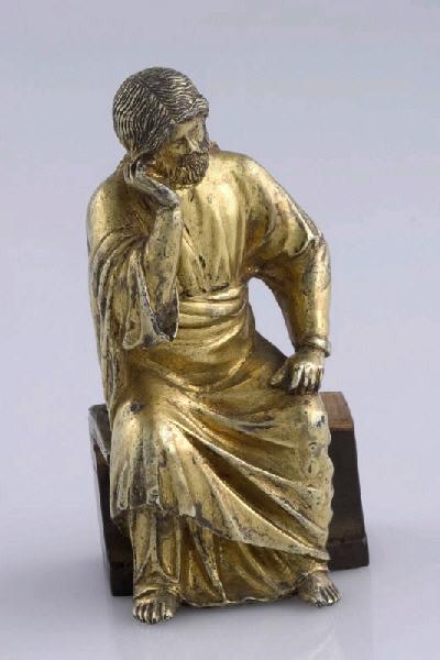 Evangéliste ; Prophète de face, se soutenant le menton dans la main droite, la main gauche posée sur sa cuisse gauche