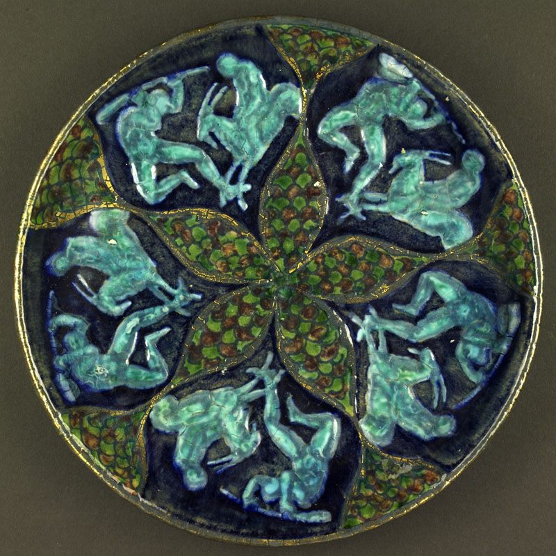 Assiette ronde aux personnages bleus