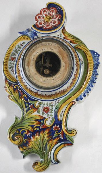 Baromètre holostérique à cartel d'applique en faïence