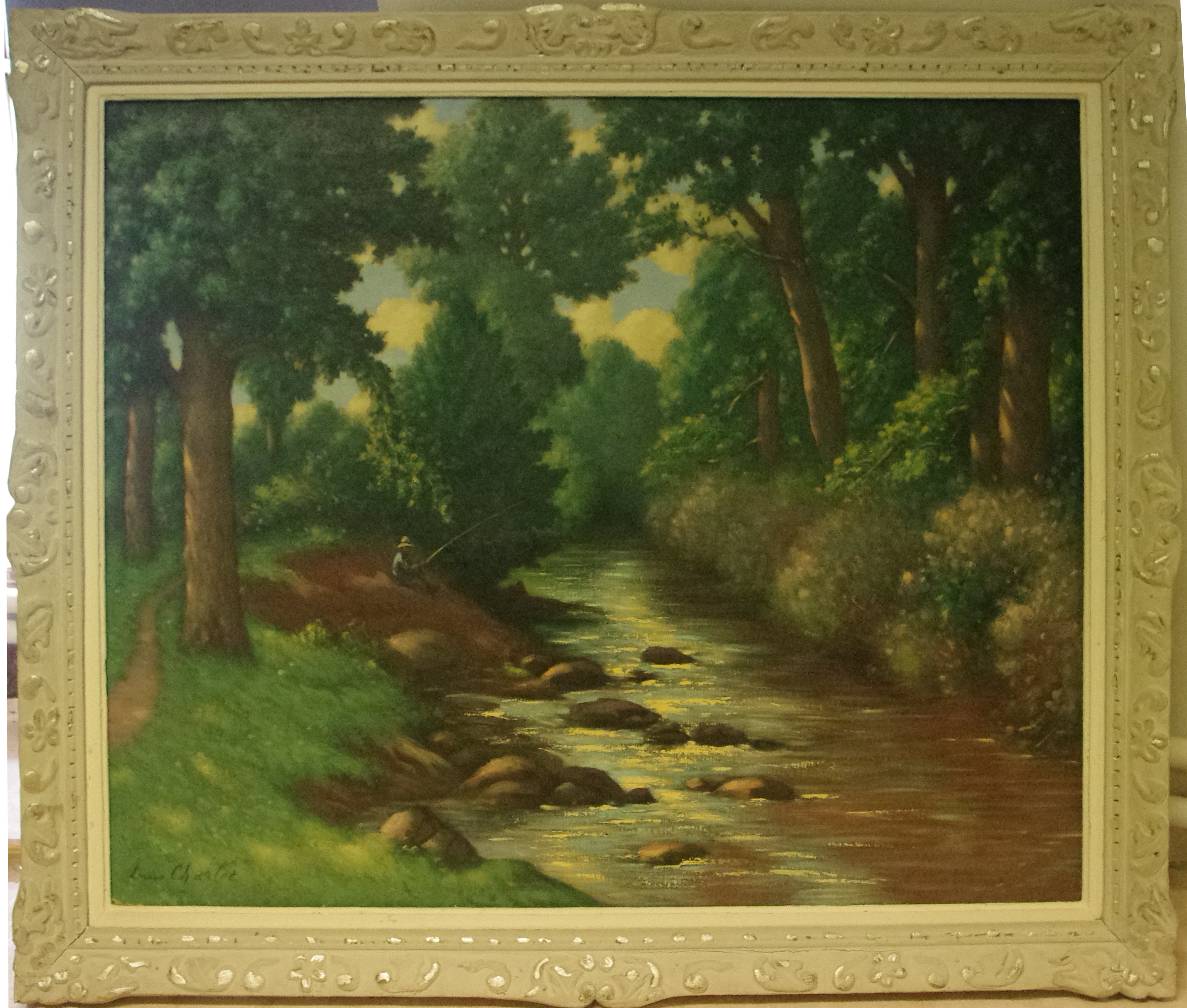 Pêcheur au bord d'une rivière