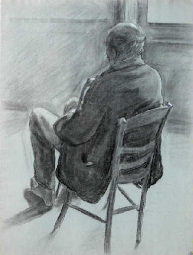 Homme assis, vu de dos