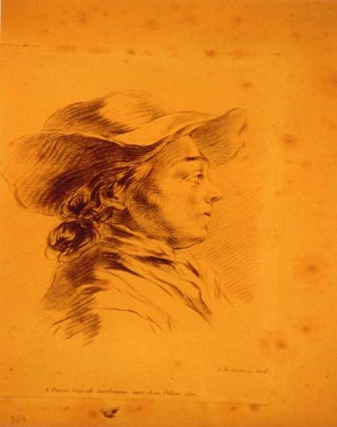 Jeune homme coiffé d'un chapeau