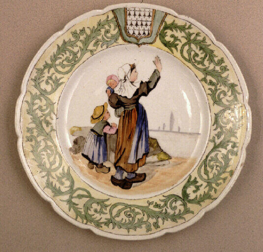 Bretonne et enfants sur un rivage