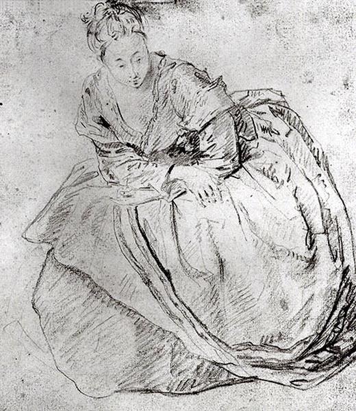 Femme assise et penchée en avant