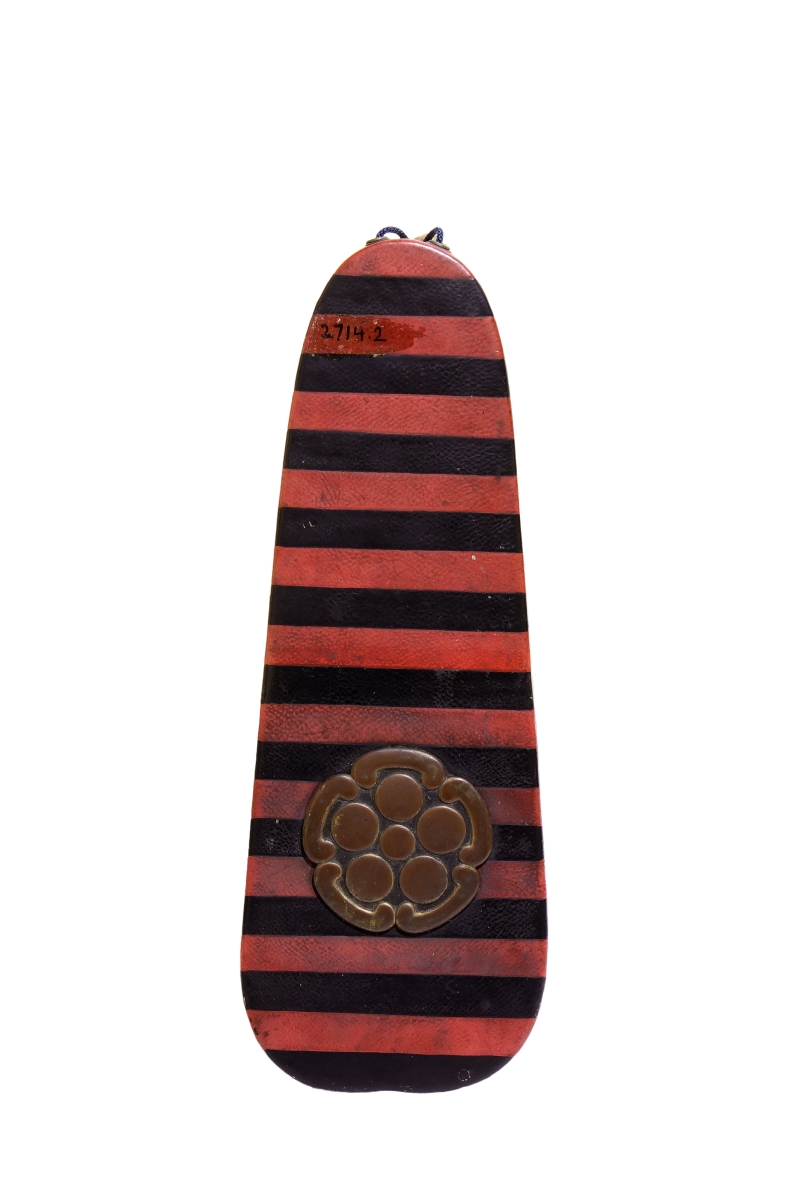 Pièce de fermeture du carquois