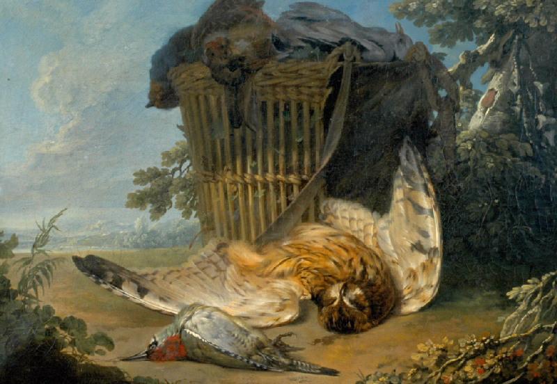 Un hibou, un pimart et un panier rempli de gibier
