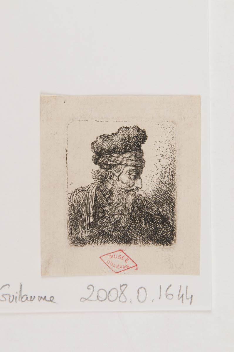 Tête d'homme barbu coiffé d'une toque de profil