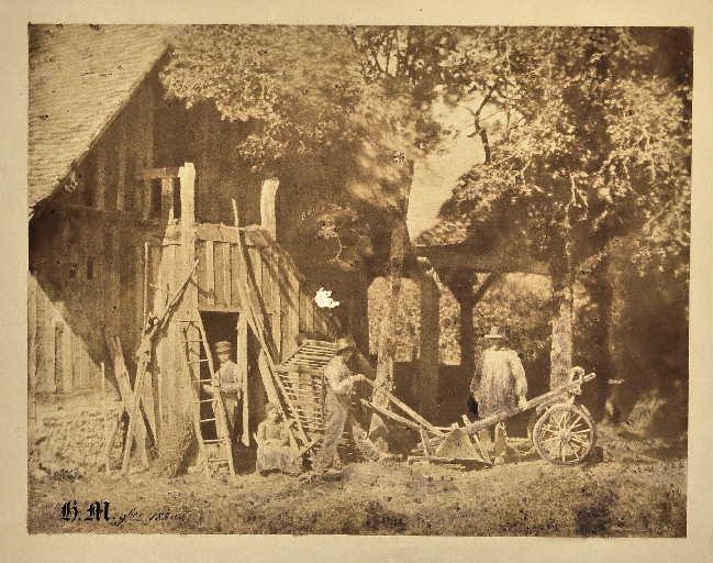 Personnages près d'une charrue à Argentelle