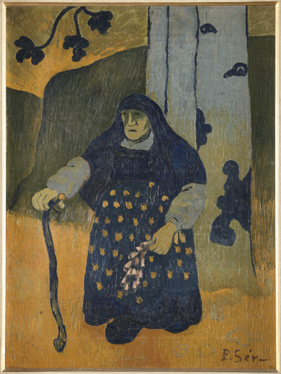 Vieille bretonne sous un arbre