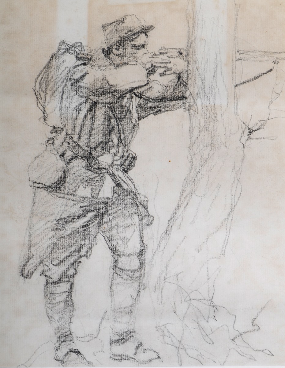 Soldat français en position de tir derrière un arbre
