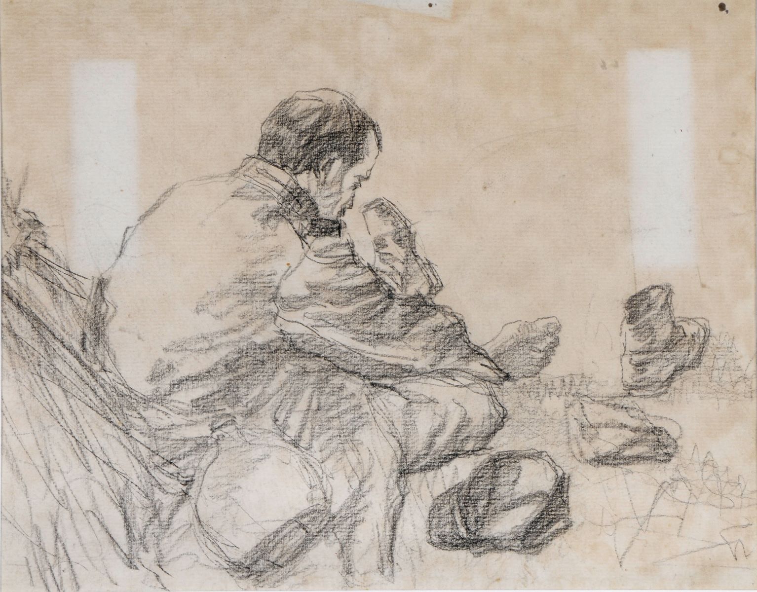 Soldat français assis ayant oté une chaussure