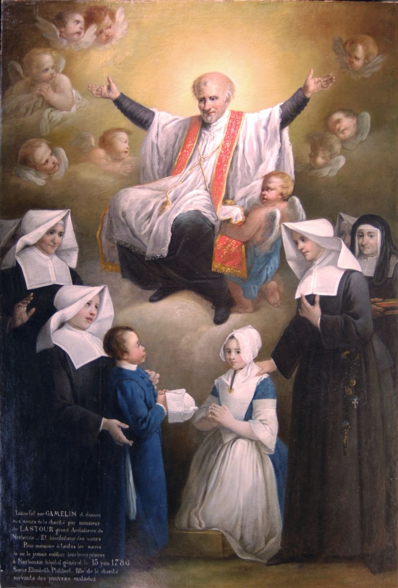 Les soeurs de la Charité en prières devant leur saint patron