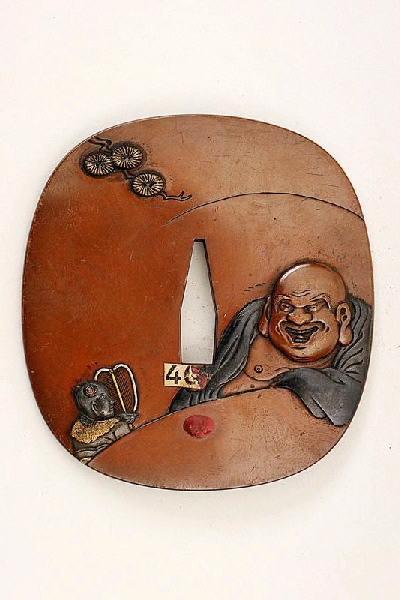 Garde de sabre ornée de la divinité Hotei et un enfant