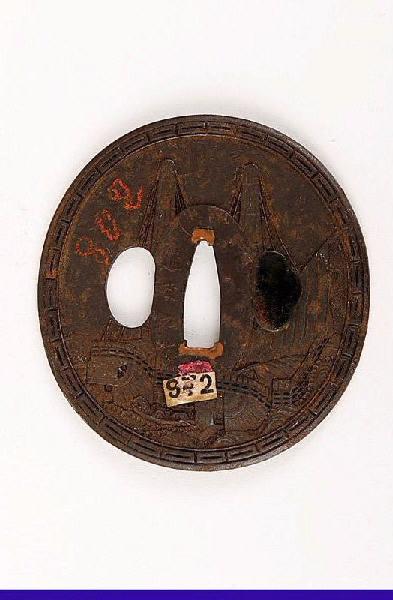 Garde de sabre ornée de paysage de bateaux sur la mer