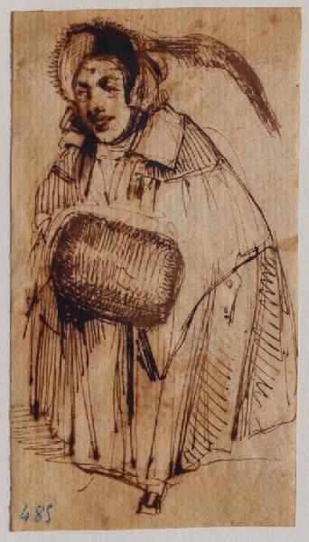 Femme portant un manchon fourré et un chapeau à plume