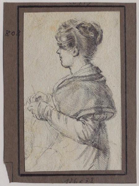 Jeune femme tricotant