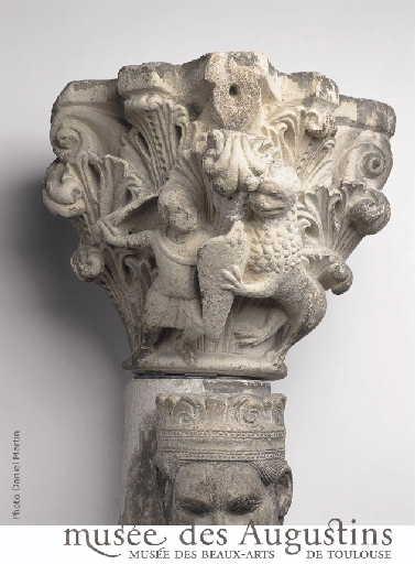 Guerrier combattant un lion