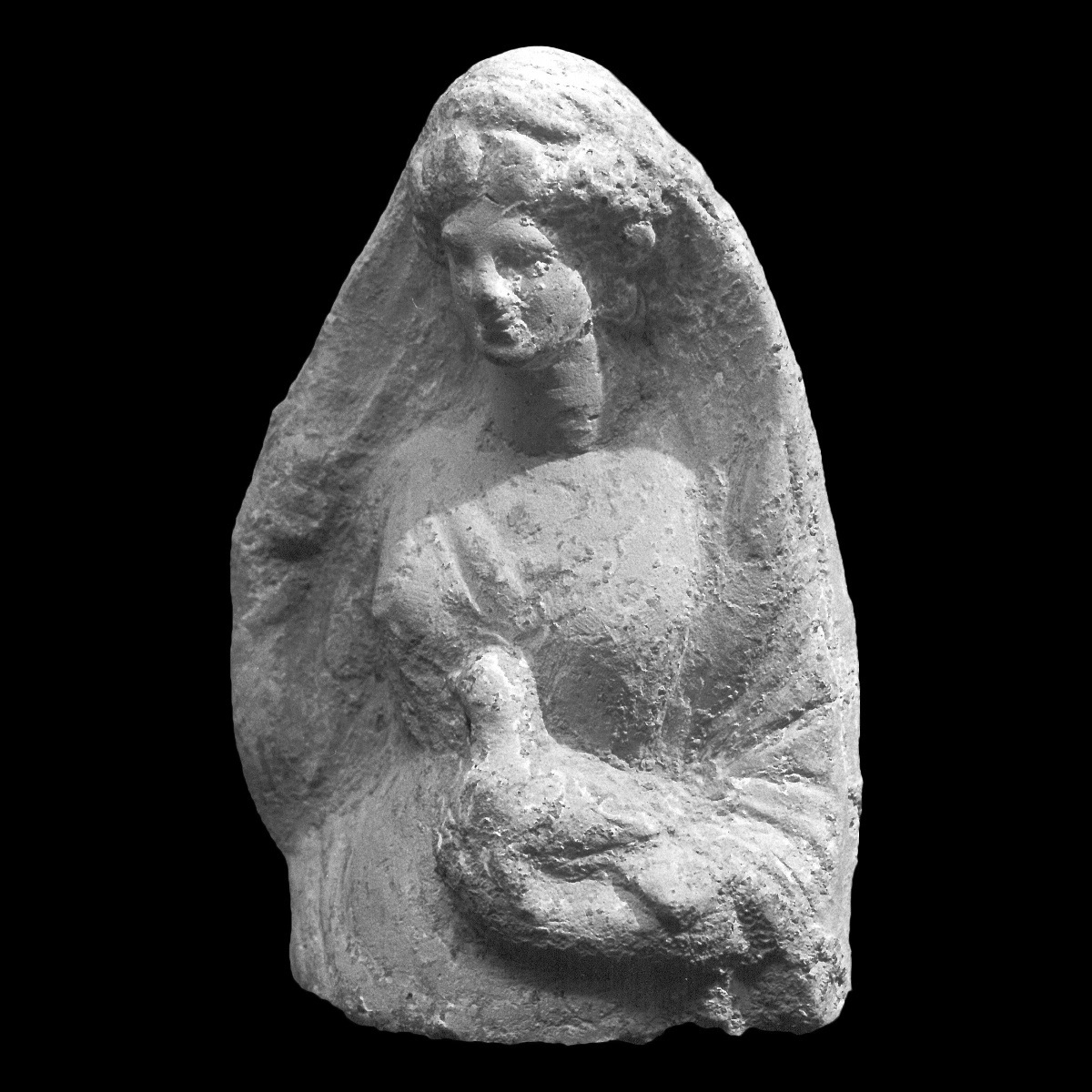 Aphrodite se dévoilant et tenant une colombe