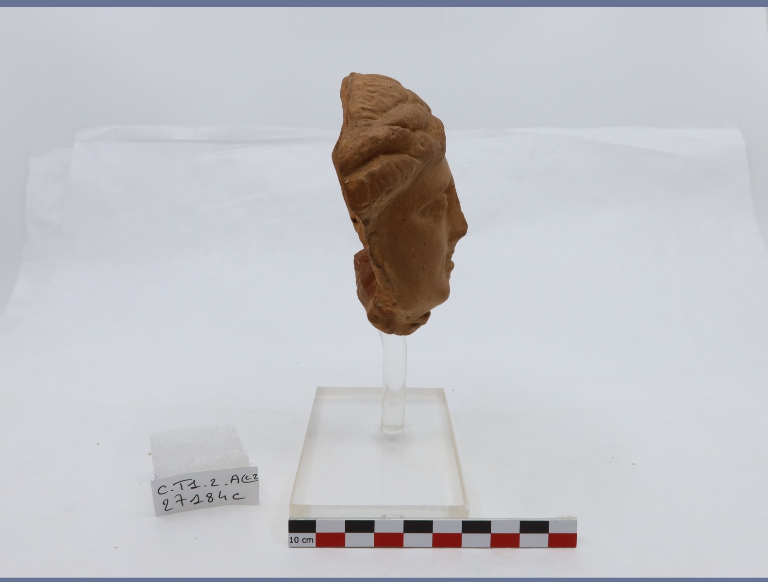 Antéfixe représentant un visage