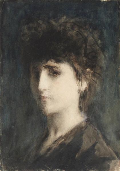 Visage de femme dans la pénombre