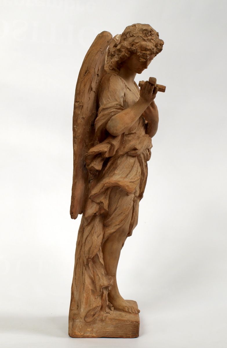 Ange méditant sur la croix