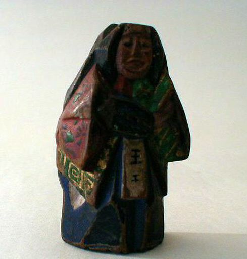 Netsuké en bois polychrome représentant un acteur de Nô