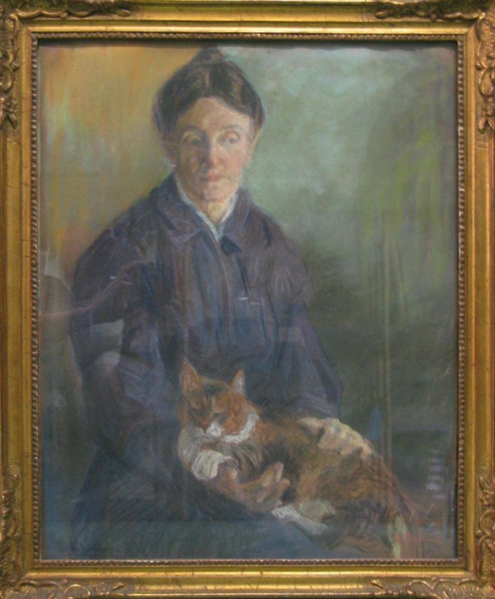 Portrait de femme assise avec un chat