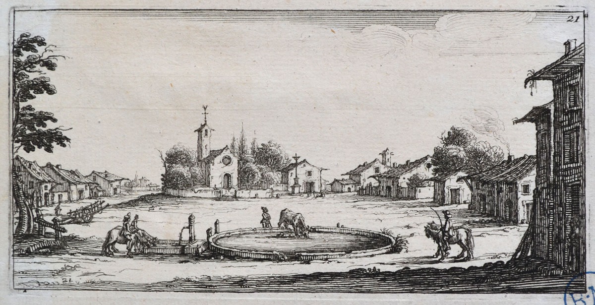 La Place d'un village avec un abreuvoir