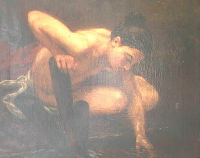 Femme assise, nue, au bord d'un ruisseau