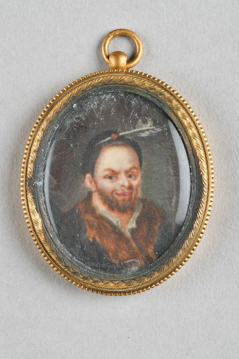 Médaillon : homme avec une plume au chapeau