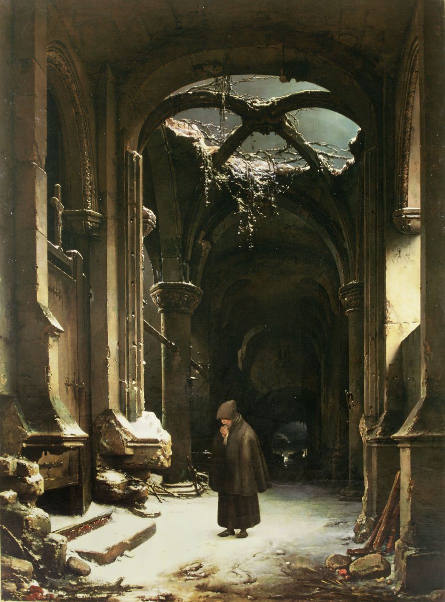 Moine en prière dans les ruines d'un monastère