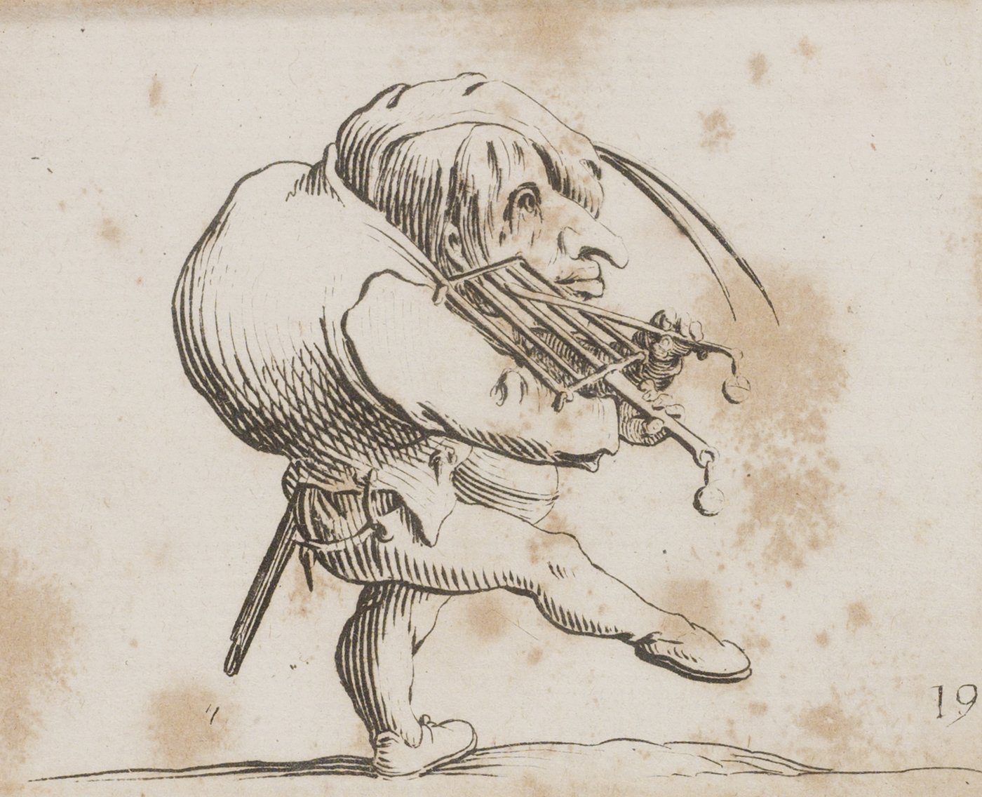 Les Gobbi : homme raclant un gril en guise de violon