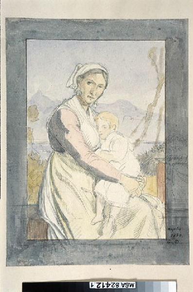 Femme tenant dans ses bras son enfant