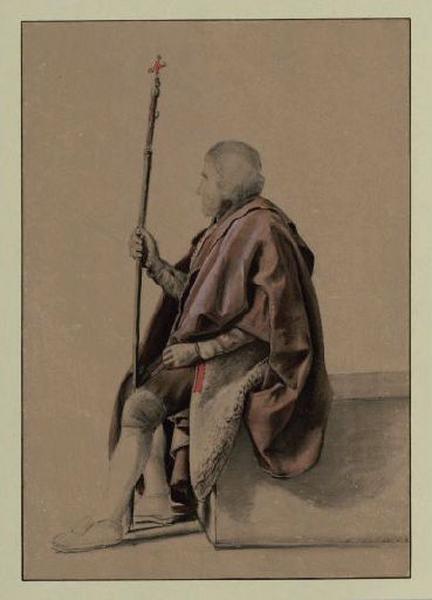 Homme assis tenant un bâton