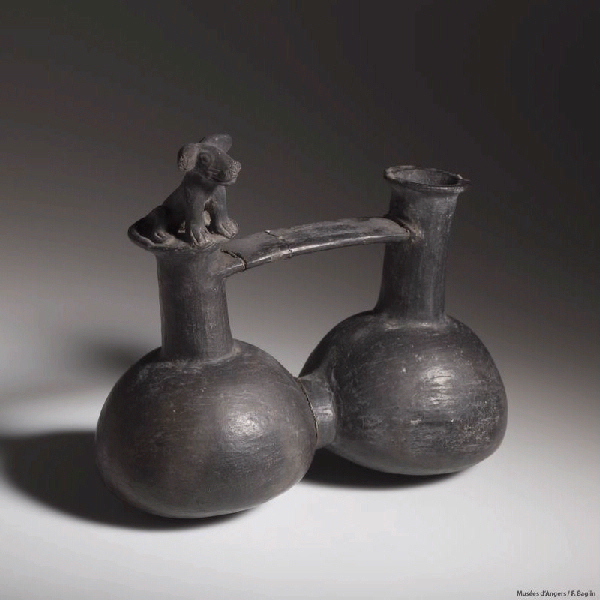 vase double siffleur géminé à anse en pont