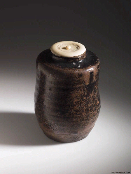 Pot à poudre de thé