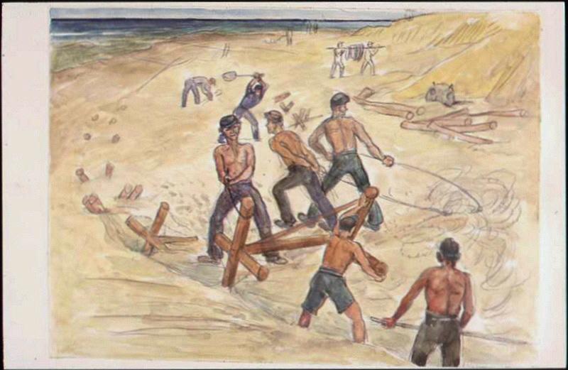 Cinq prisonniers enlevant des fils de fer sur une plage 5