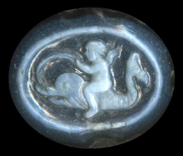 Amour chevauchant un dauphin