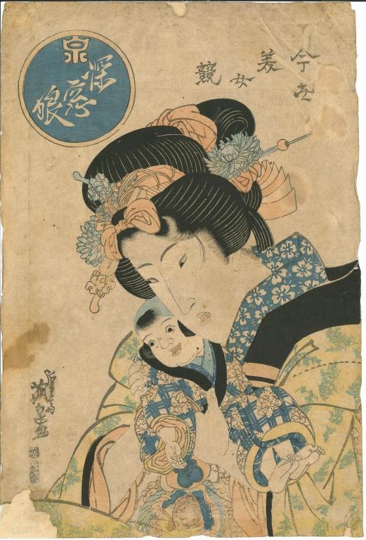 Jeune femme portant un enfant