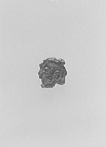 FRAGMENT D'ENSEIGNE DE PELERINAGE : TETE D'HOMME